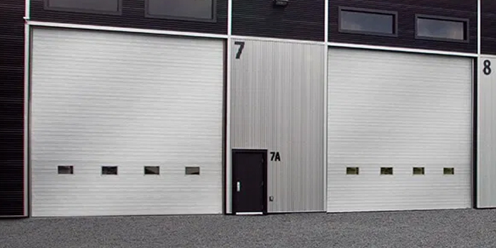 fix bent garage door in Burquitlam or Lougheed